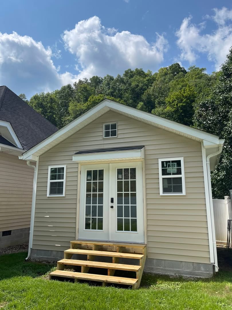 Home addition with French doors and new steps